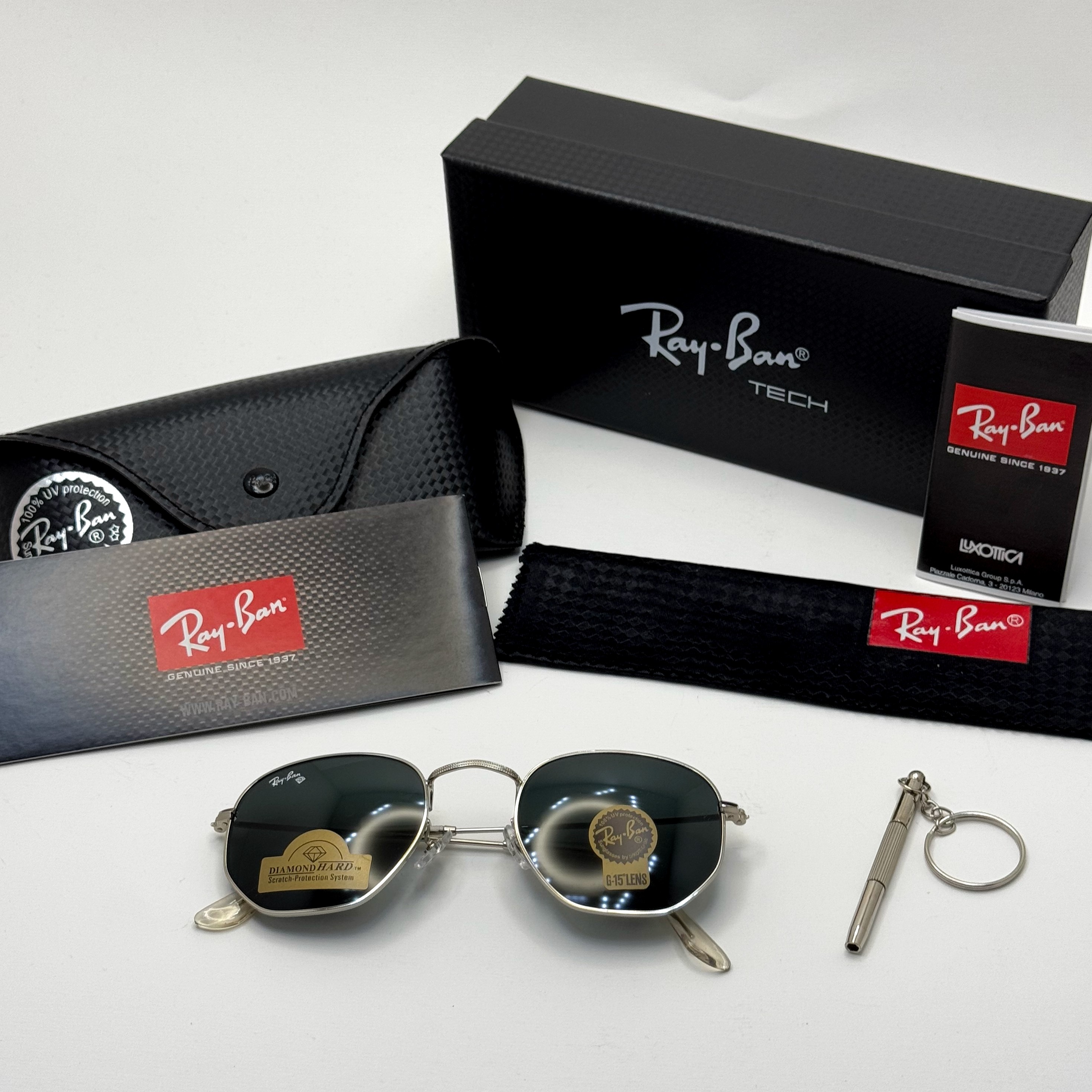 عینک ریبن هگزونال شیشه سنگ مشکی فریم نقره ای به همراه پک کامل ریبن کد Rayban RB 3548