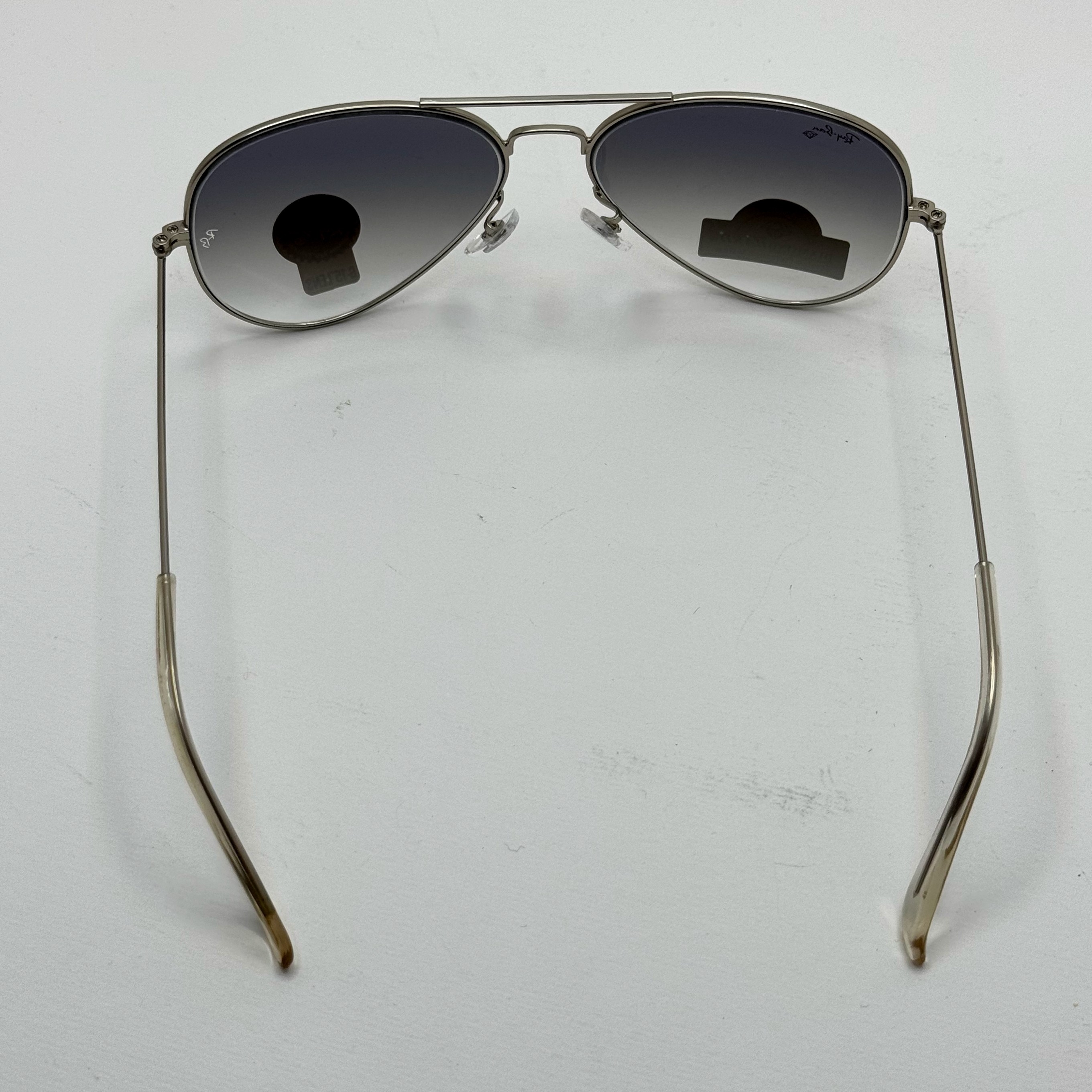 عینک ریبن خلبانی شیشه سنگ آبی هایلایت فریم نقره ای به همراه پک کامل ریبن Rayban RB 3025