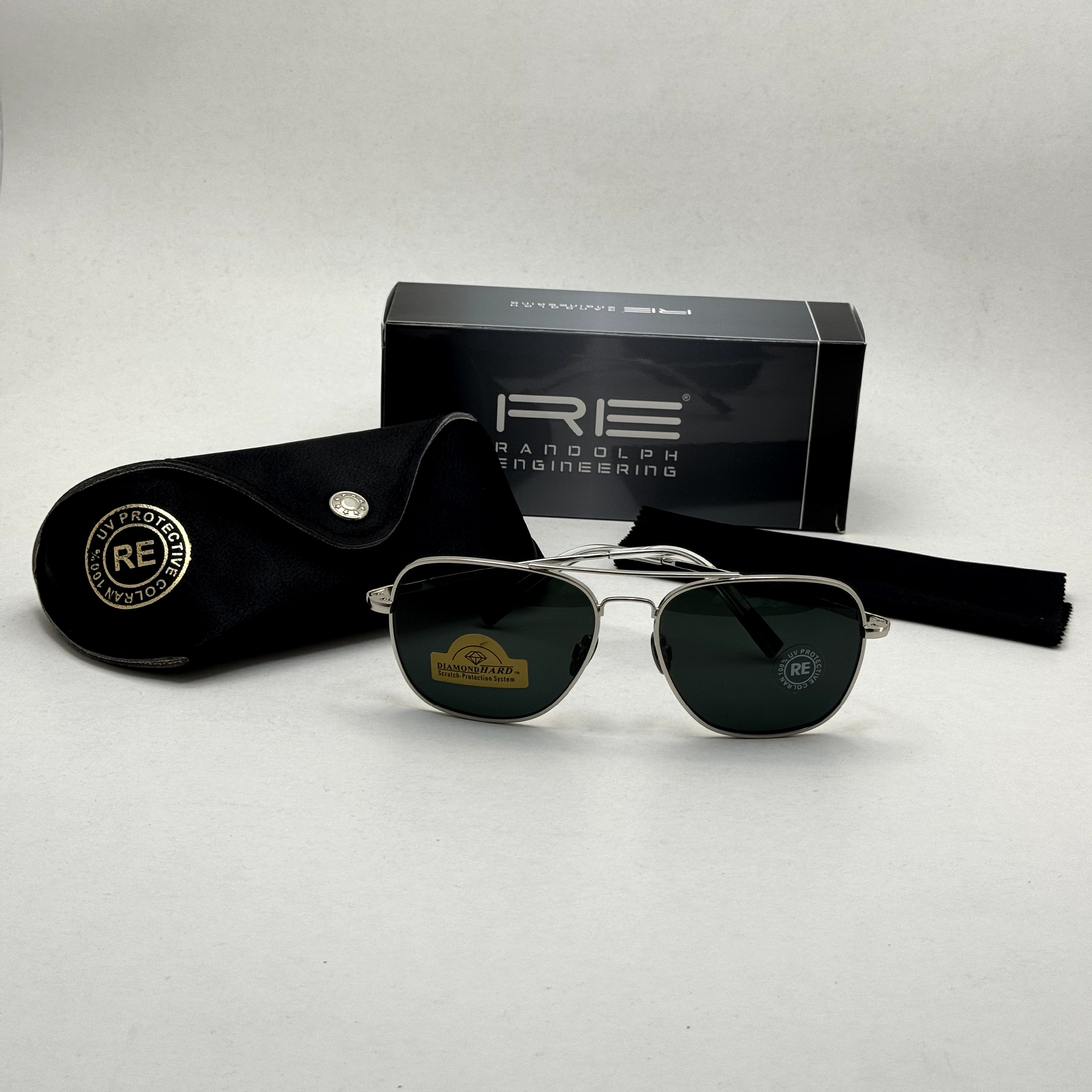 عینک آفتابی خلبانی رندولف شیشه سنگ آنتی رفلکس مشکی فریم نقره ای فول پک RANDOLPH AVIATOR RE 58 WHITE GOLD