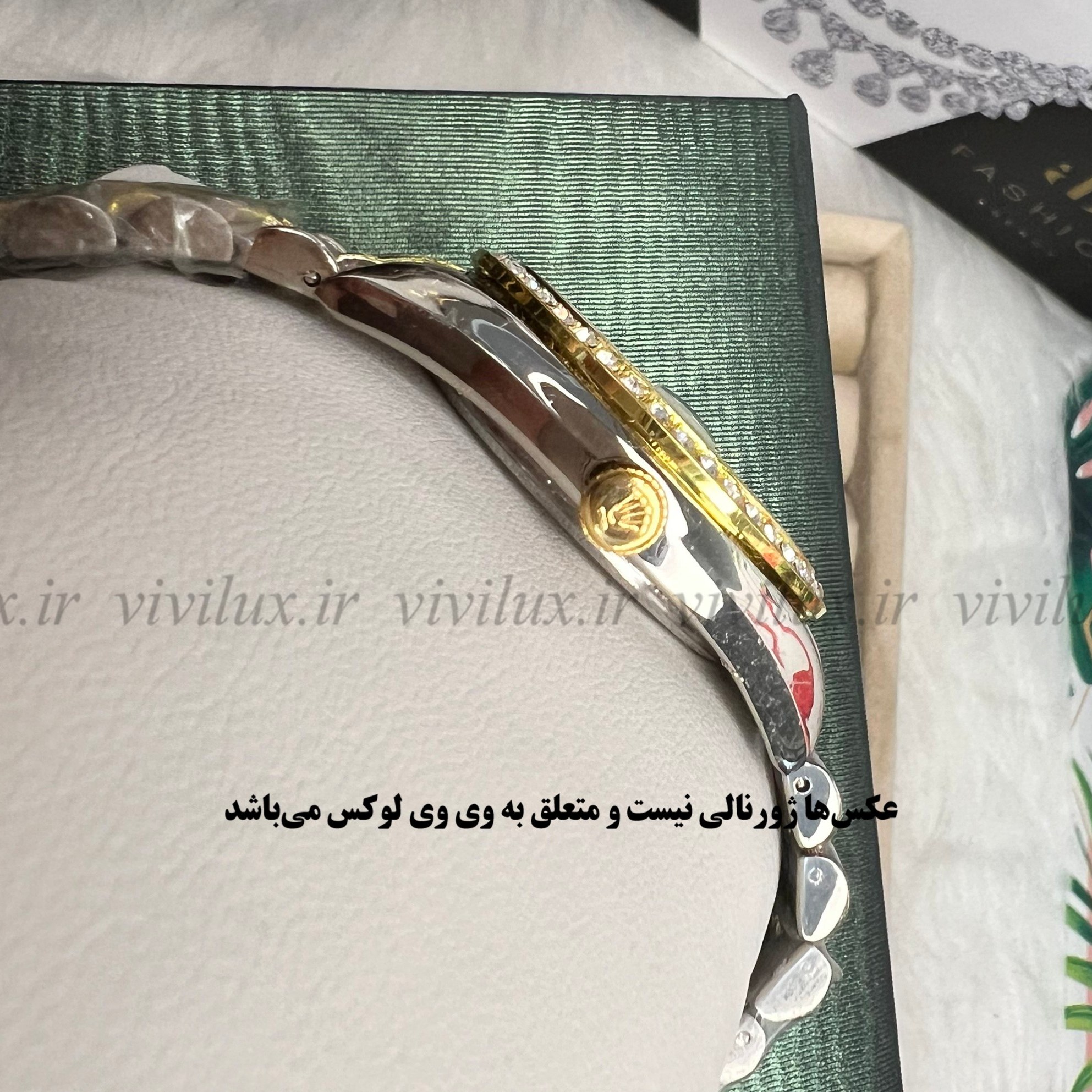 ساعت زنانه رولکس نگین دار قفل اصلی آبی مالتی کالر
