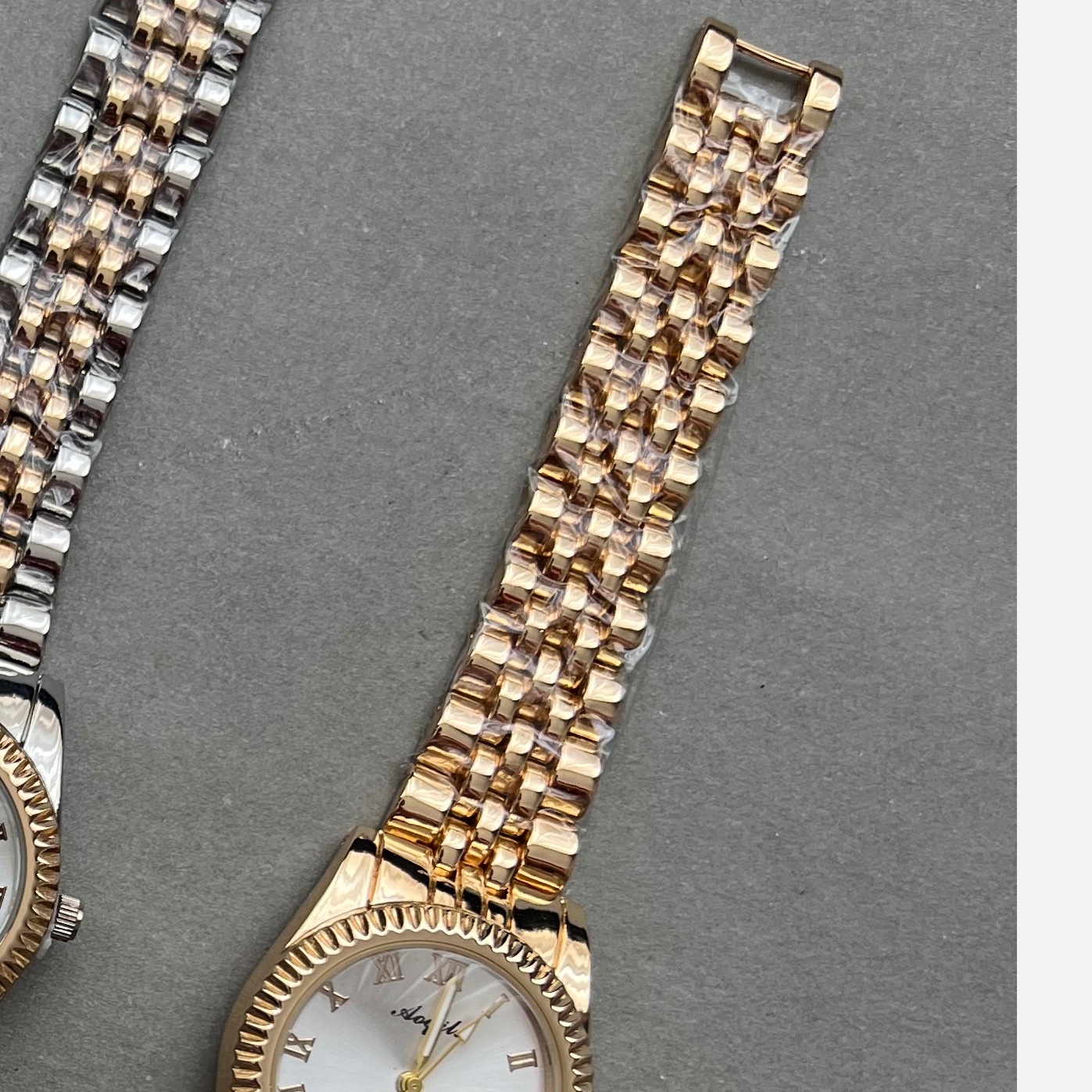 ساعت دخترانه اکیلی تمام نقره ای بند باز صفحه سفید