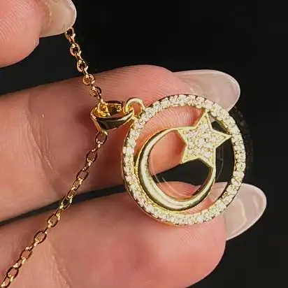 گردنبند و آویز زنانه جواهری طرح حلقه ای ماه و ستاره نگین کاری رنگ طلایی ضد حساسیت رنگ کاملا ثابت کد atk (پس کرایه)