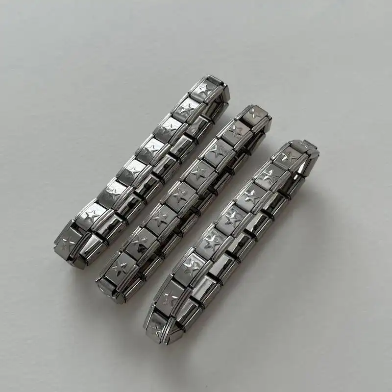 دستبند چارم یونیسکس (مردانه و زنانه) ستاره ای رنگ نقره ای استیل عیار 316 ضد حساسیت و رنگ ثابت کد zsf (پس کرایه)