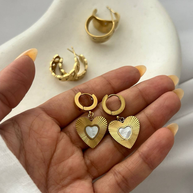 گوشواره استیل زنانه طرح دو قلب تنوع طرح رنگ ثابت و ضد حساسیت کد tj (پس کرایه)