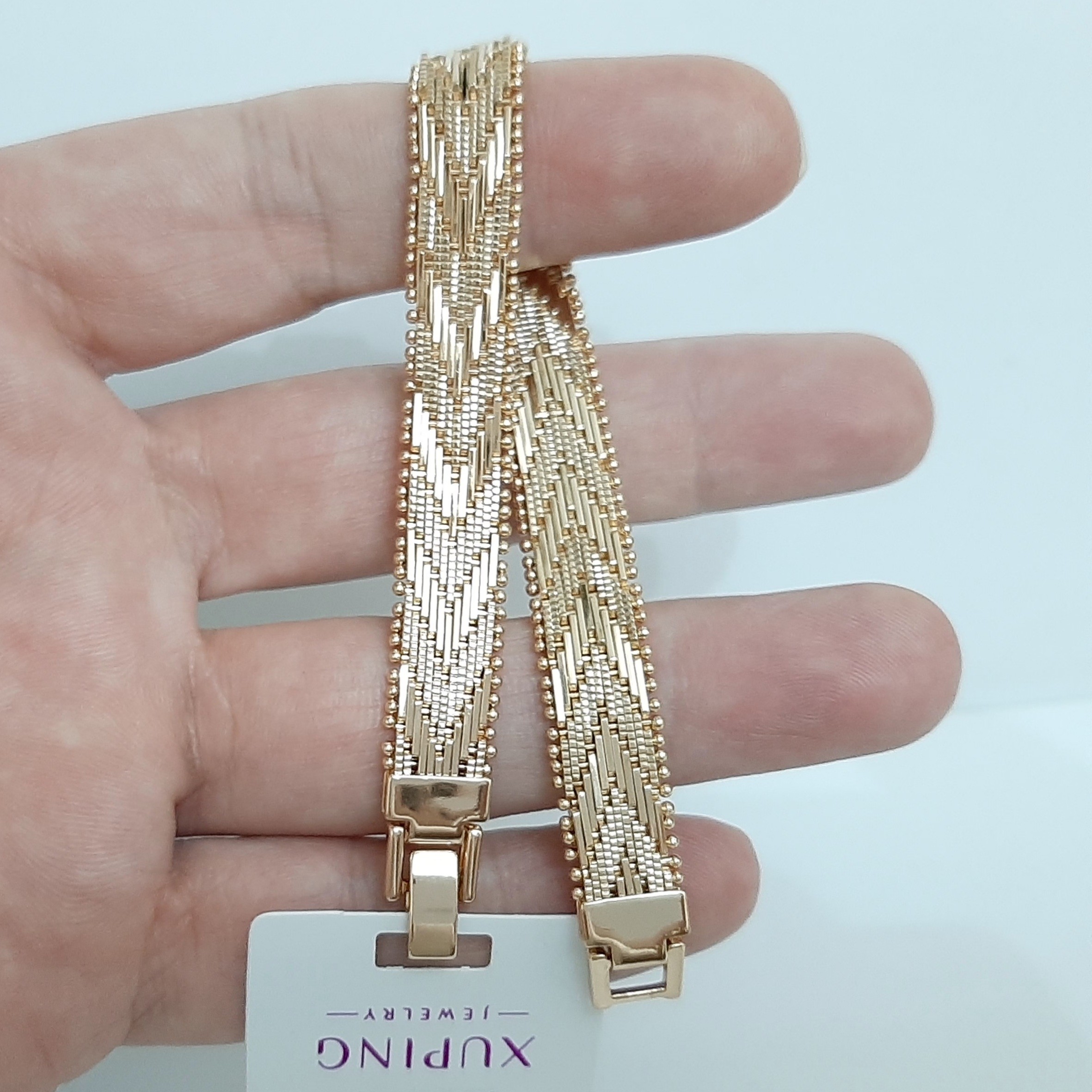 دستبند ژوپینگ کاملا رنگ ثابت و با طلا مونمیزنه ورق بزنید و توضیحات رو بخونید لطفا