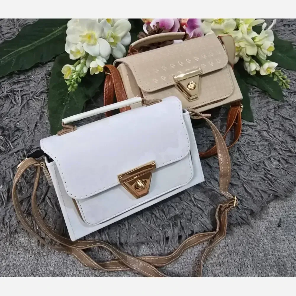 کیف زنانه مدل شادگان جنس چرم نانسی ابعاد 10 در 20 سانتیمتر (2)