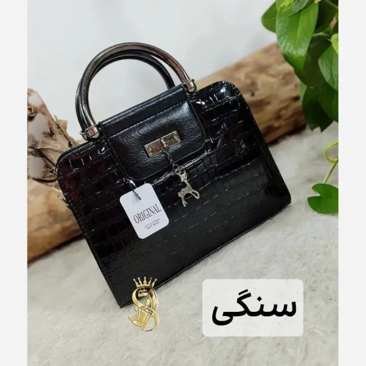 کیف مجلسی زنانه ورنی مدل اهو ابعاد 19 در 25 سانتیمتر