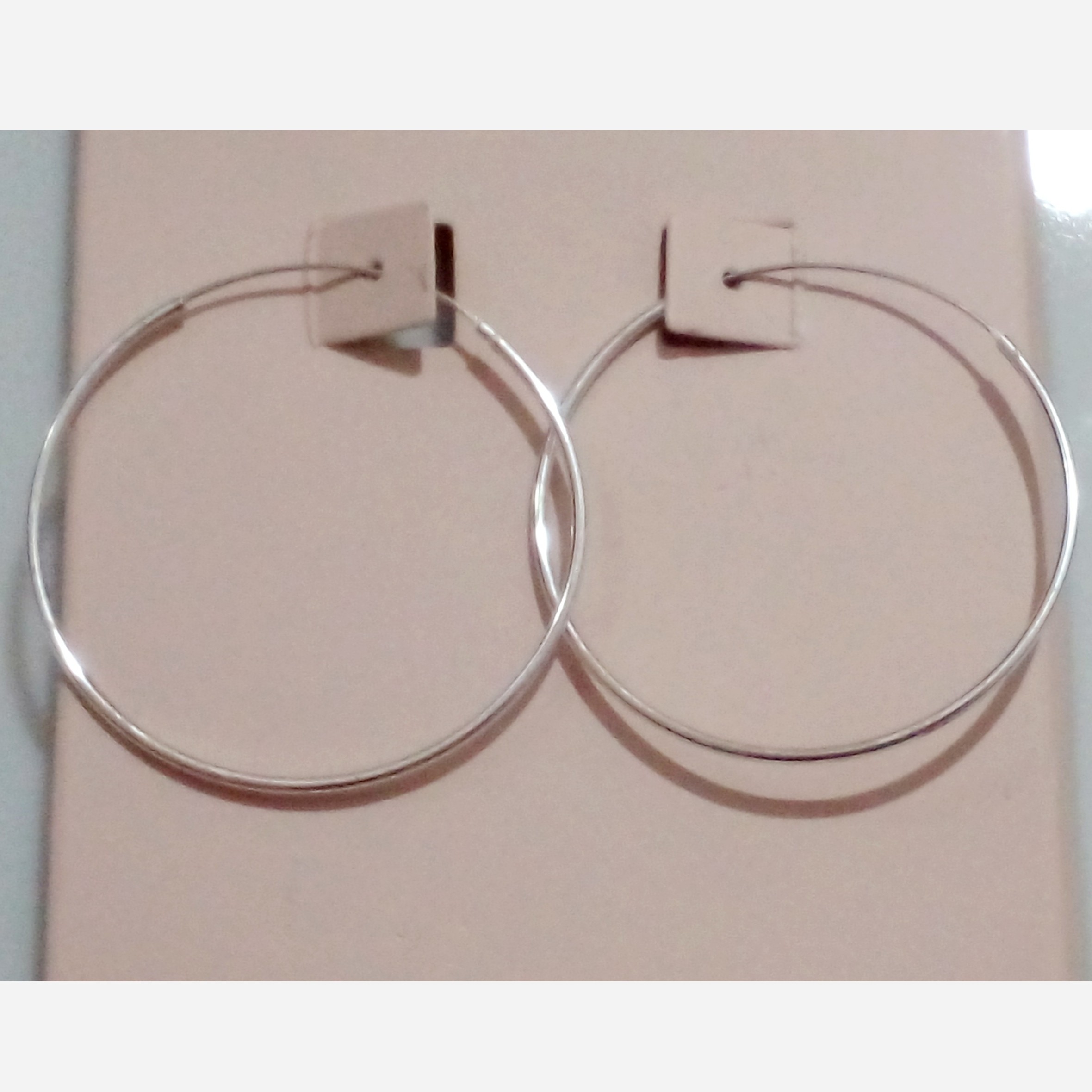 گوشواره حلقه ایی نقره با حک عیار 925 از برند sterling silver