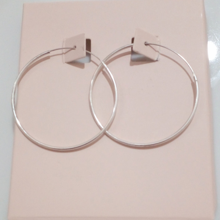 گوشواره حلقه ایی نقره با حک عیار 925 از برند sterling silver