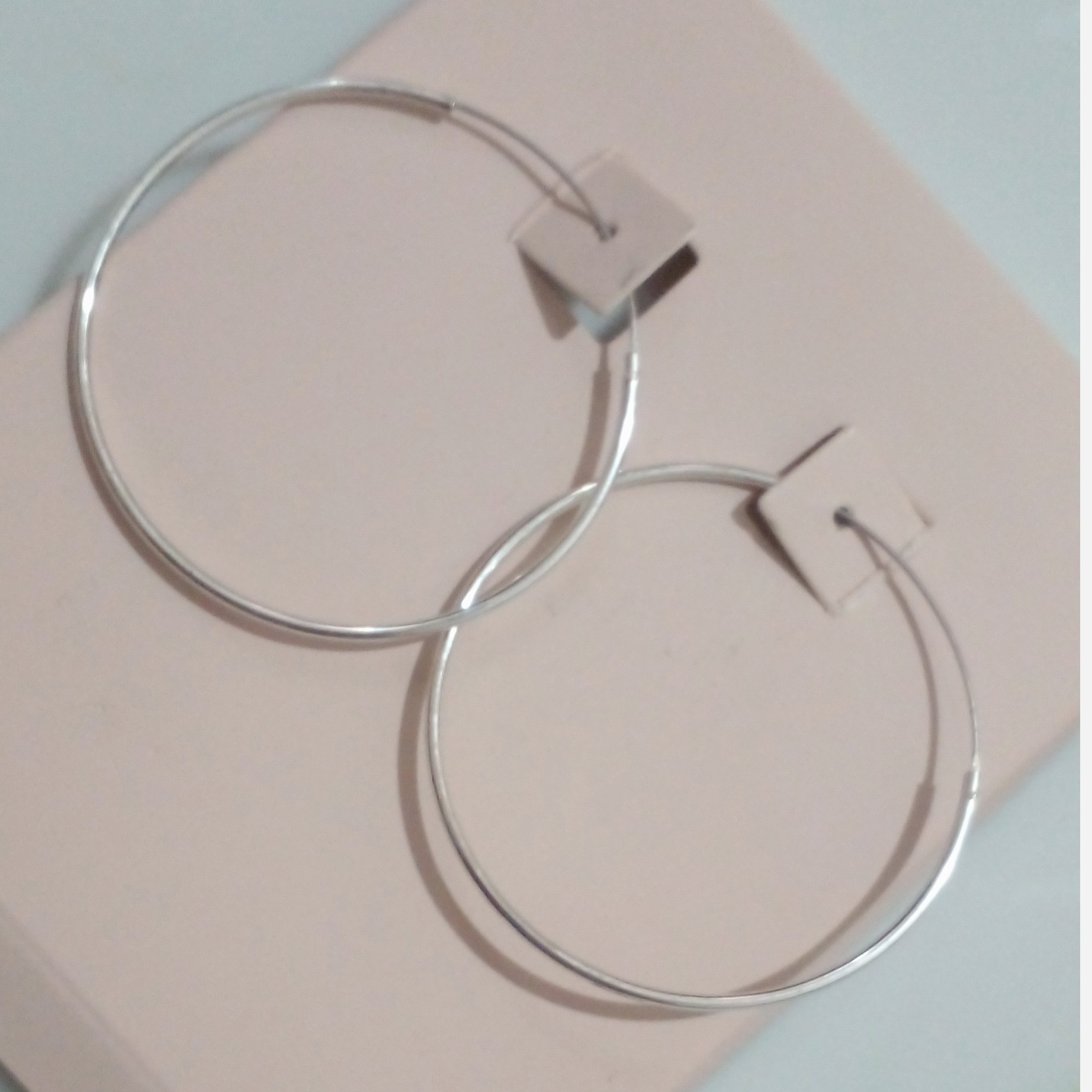 گوشواره حلقه ایی نقره با حک عیار 925 از برند sterling silver