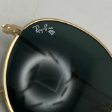 عینک آفتابی ریبن rayban گرد مشکی طلایی شیشه سنگ RB 3447
