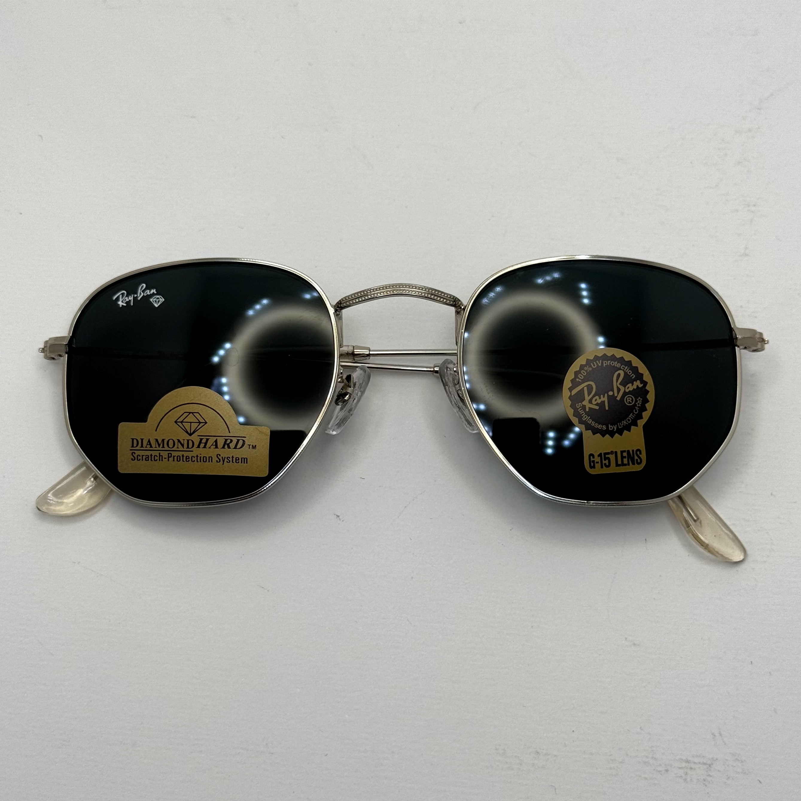 عینک ریبن هگزونال شیشه سنگ مشکی فریم نقره ای به همراه پک کامل ریبن کد Rayban RB 3548 (ارسال رایگان)