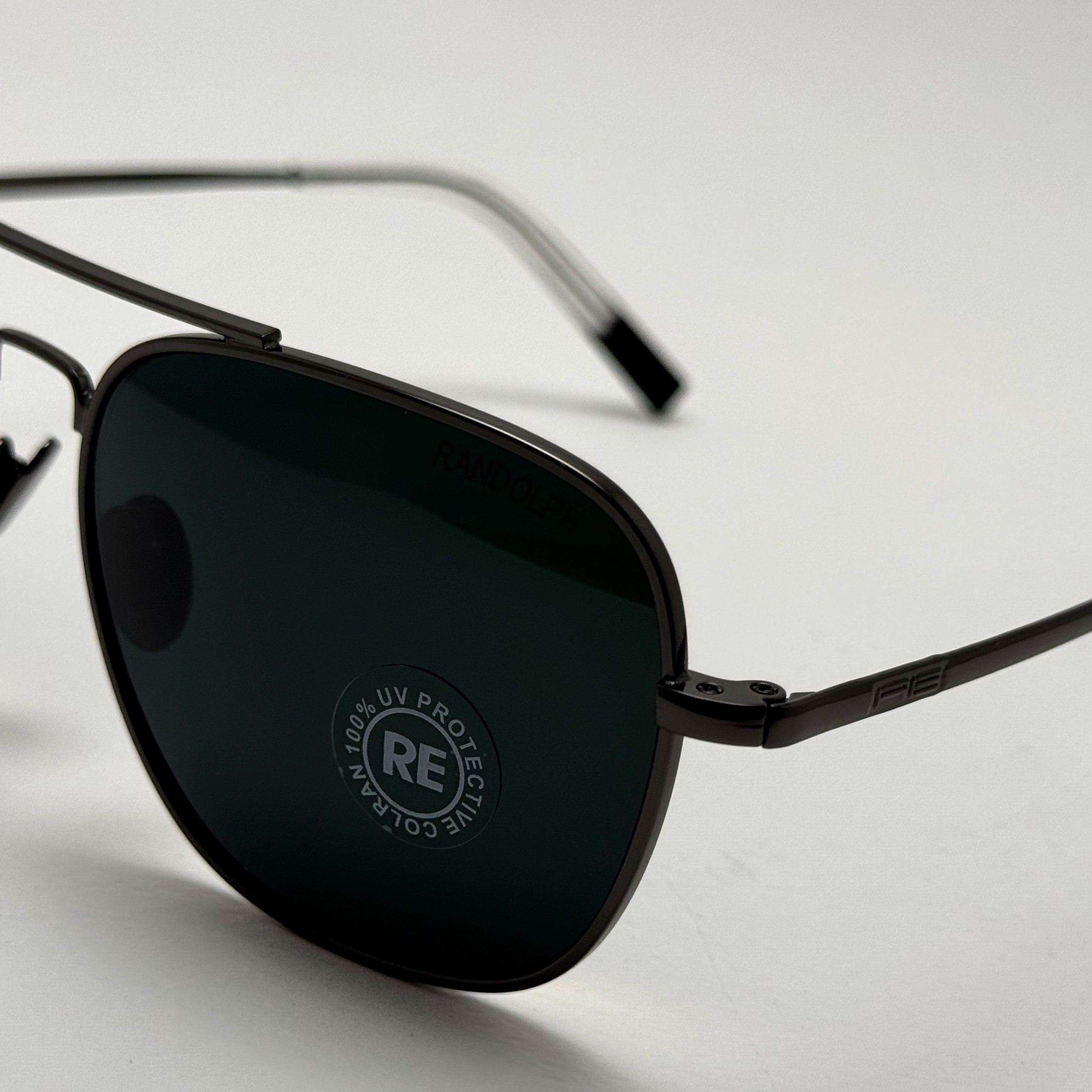 عینک آفتابی خلبانی رندولف شیشه سنگ آنتی رفلکس مشکی فریم نوک مدادی فول پک RANDOLPH AVIATOR RE 58 24K WHITE GOLD (ارسال
